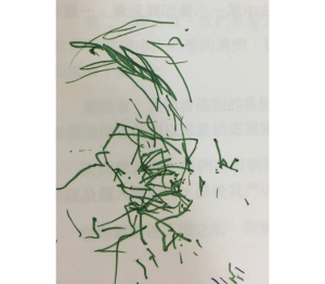 一歲兒童的塗鴉，多為短、單色線段或點。